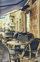 Cafe in the old town in Europe, vintage processing