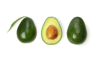 Fresh ripe avocados on white background