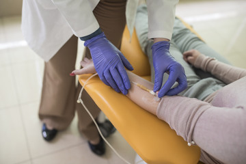 Doctor Giving Therapy to Patient