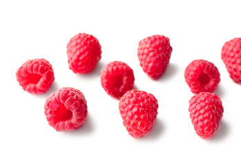 Delicious fresh ripe raspberries on white background