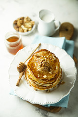 Pancakes with honey and nuts