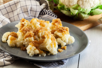 Vegetarian cooked cauliflower with bread crumb