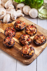 Baked champignon caps stuffed with minced meat