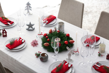 Stylish table setting with Christmas decorations