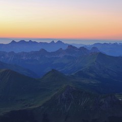 Mountain ranges in Vaud Canton at sunset. View from Glacier 3000, Switzerland.