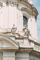 The architecture of Rome and the Italian style in stucco. Sights of the old town, tourist places. Street art, world heritage. Miracle of light. Carved columns and capitals