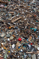 Plastic waste washed up on a beach.