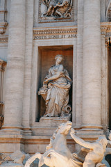 The Trevi fountain in Rome, a beautiful sight. Ancient architecture and sculpture. Art on the street, the most beautiful fountain in Europe