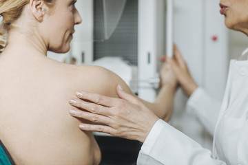 Obraz na płótnie Canvas Woman Doing Mammogrm Screening