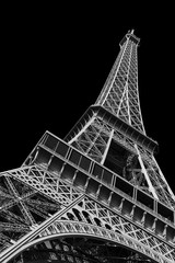 Beautiful view of the Eiffel tower seen from beneath in Paris, isolated in black and white
