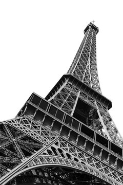 Fototapeta Beautiful view of the Eiffel tower seen from beneath in Paris, isolated in black and white  