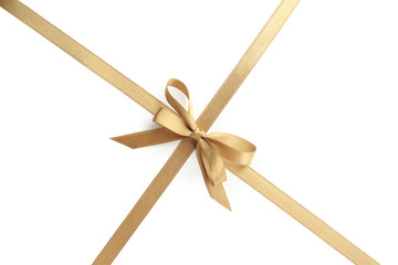 Golden ribbons with bow on white background