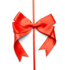 Red ribbon with bow on white background