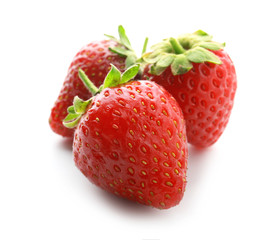 Ripe strawberries on white background