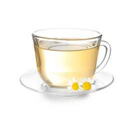 Glass cup of delicious camomile tea on white background
