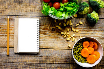 concept diet, slimming plan with vegetables top view mock up