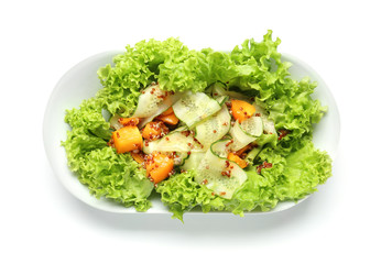Plate with healthy fresh salad on white background