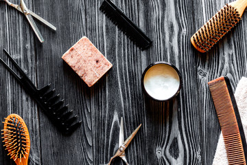 Tools for cutting beard barbershop top view on wooden background