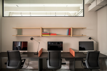 Stylish office in loft style with gray walls