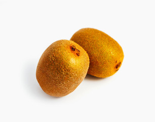 Fototapeta premium Two golden kiwi fruits isolated on white background.