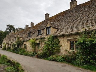 Fototapeta na wymiar Old, historic, country houses in Bibury, Cotswolds, England
