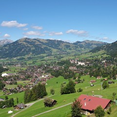 Fototapeta na wymiar Gstaad in summer. Famous village in the Bernese Oberland. Switzerland. 