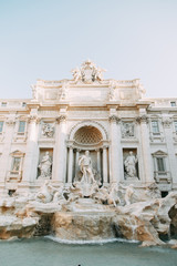 The Trevi fountain in Rome, a beautiful sight. Ancient architecture and sculpture. Art on the street, the most beautiful fountain in Europe. Miracle of light