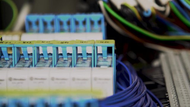 4K slider shot of wires of an programmable logic controller