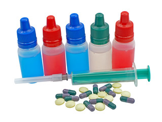 Medical pills, syringe and plastic bottles isolated on white