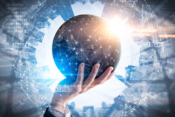 The double exposure image of the businessman hold the virtual hologram on hand and element of this image furnished by Nasa. the concept of communication network, internet of things and future life