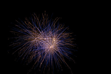 Fototapeta premium fireworks at night at the sea