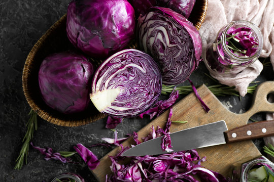 Composition with cut red cabbage on grunge table