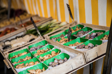 Mushrooms in a stand of Bastille street market in Paris, France