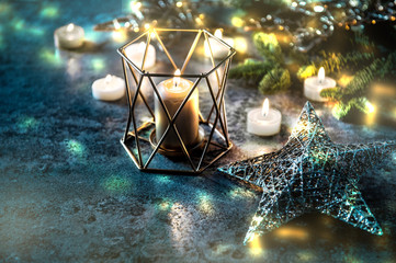 Fototapeta na wymiar Christmas background candles stars lights bokeh decoration