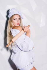 Woman cook. Sexy housewife. Vacancy for work. Cooking. .professional chef woman in modern restaurant. cooking, technology and food concept - smiling female chef, cook or baker