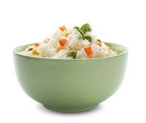 Bowl with tasty boiled rice and vegetables on white background