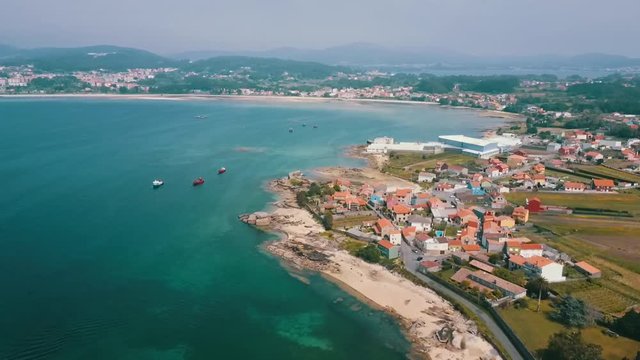 Beautiful aerial view of a landscape including traditional houses of the seaside at Boiro village, Galicia, Spain.