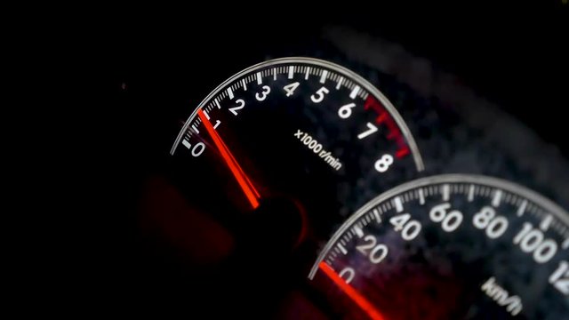 a movement of car speed meter up and down