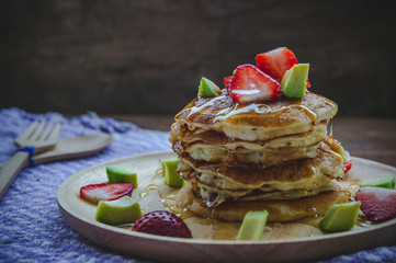 pancake strawberry avocado fruit and honey syrup sweet dessert on wood table pan cake dessert homemade