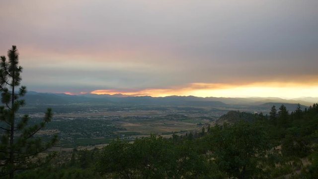Sunset in the Rogue Valley, Southern Oregon from Roxy Ann Peak during Fire Season.
