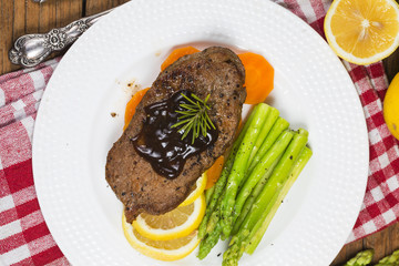 Fried steak, asparagus