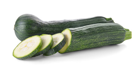 Ripe zucchinis on white background