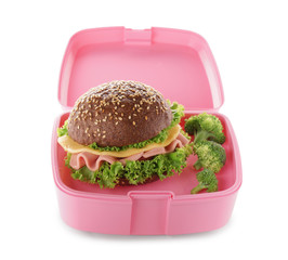 Food for schoolchild in lunch box on white background