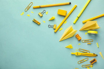 Set of school stationery on color background