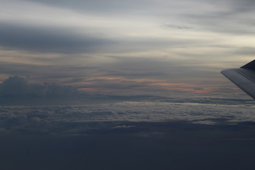 Fototapeta na wymiar Beautiful cloudscape captured during the flight