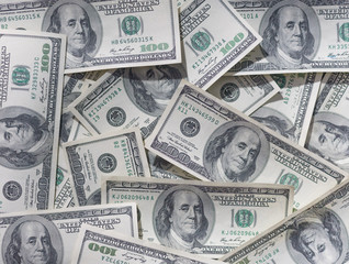 Background of one hundred dollar bills