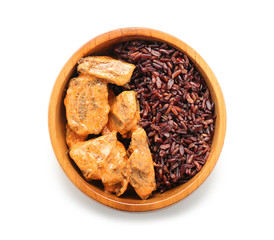 Tasty boiled wild rice with meat in bowl, isolated on white
