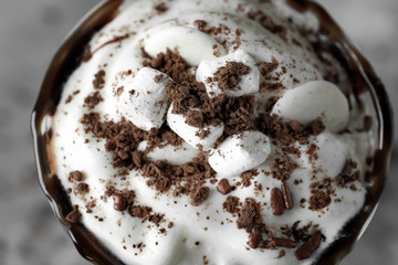 Cup of delicious cocoa with marshmallows, closeup