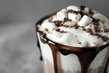 Cup of delicious cocoa with marshmallows, closeup