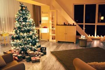 Beautiful decorated Christmas tree in living room
